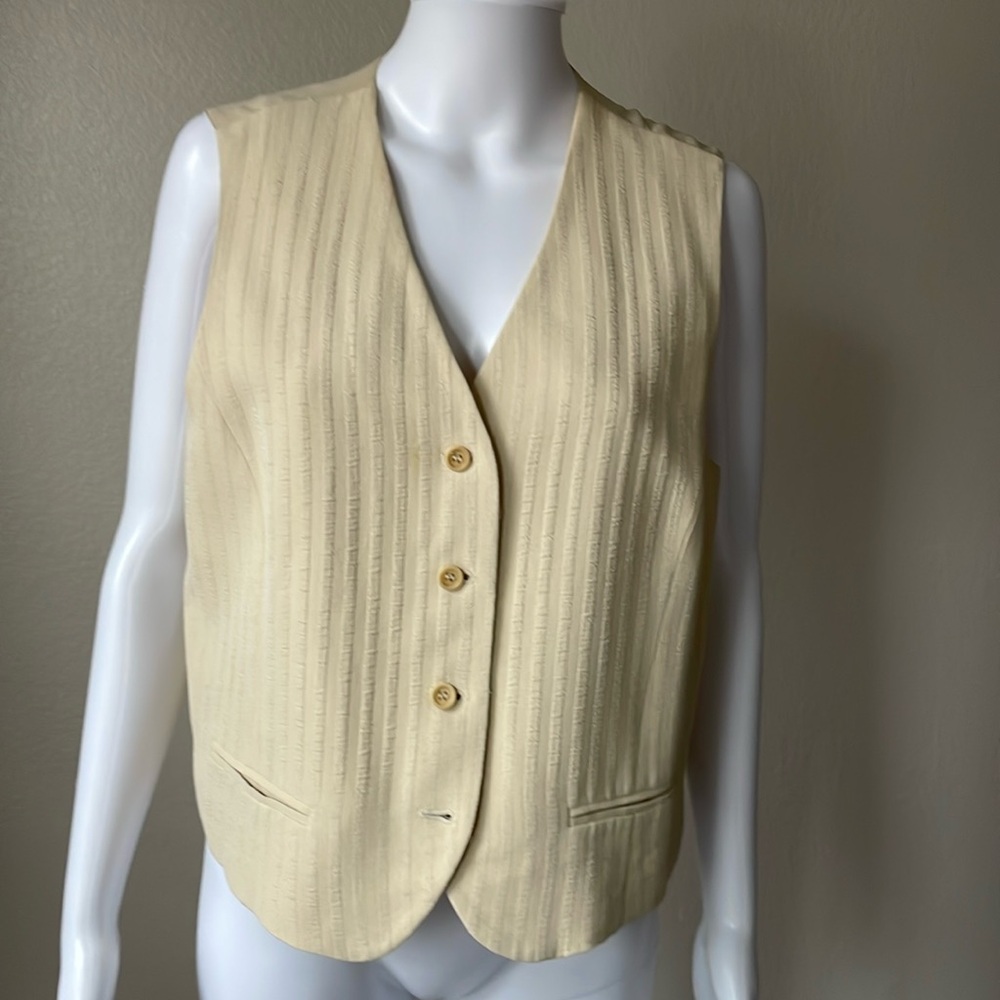 Vintage Gruppo  GED beige v-neckline vest with 100% silk lining.